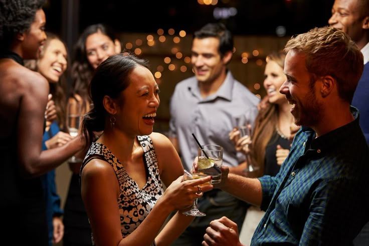 couple-striking-up-conversation-drinking-dancing.jpeg
